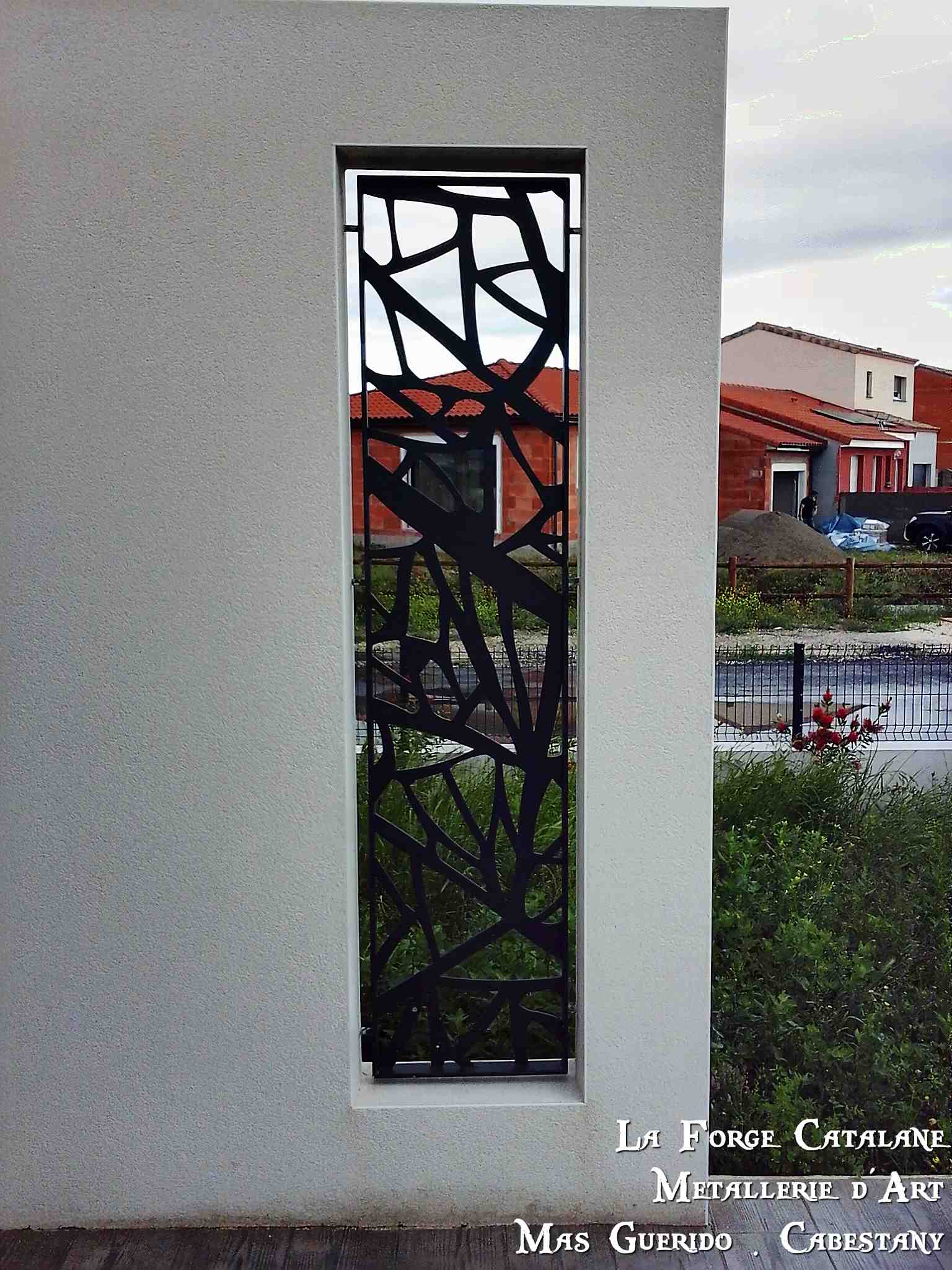 decoupe laser habillage maison forge catalane.jpg